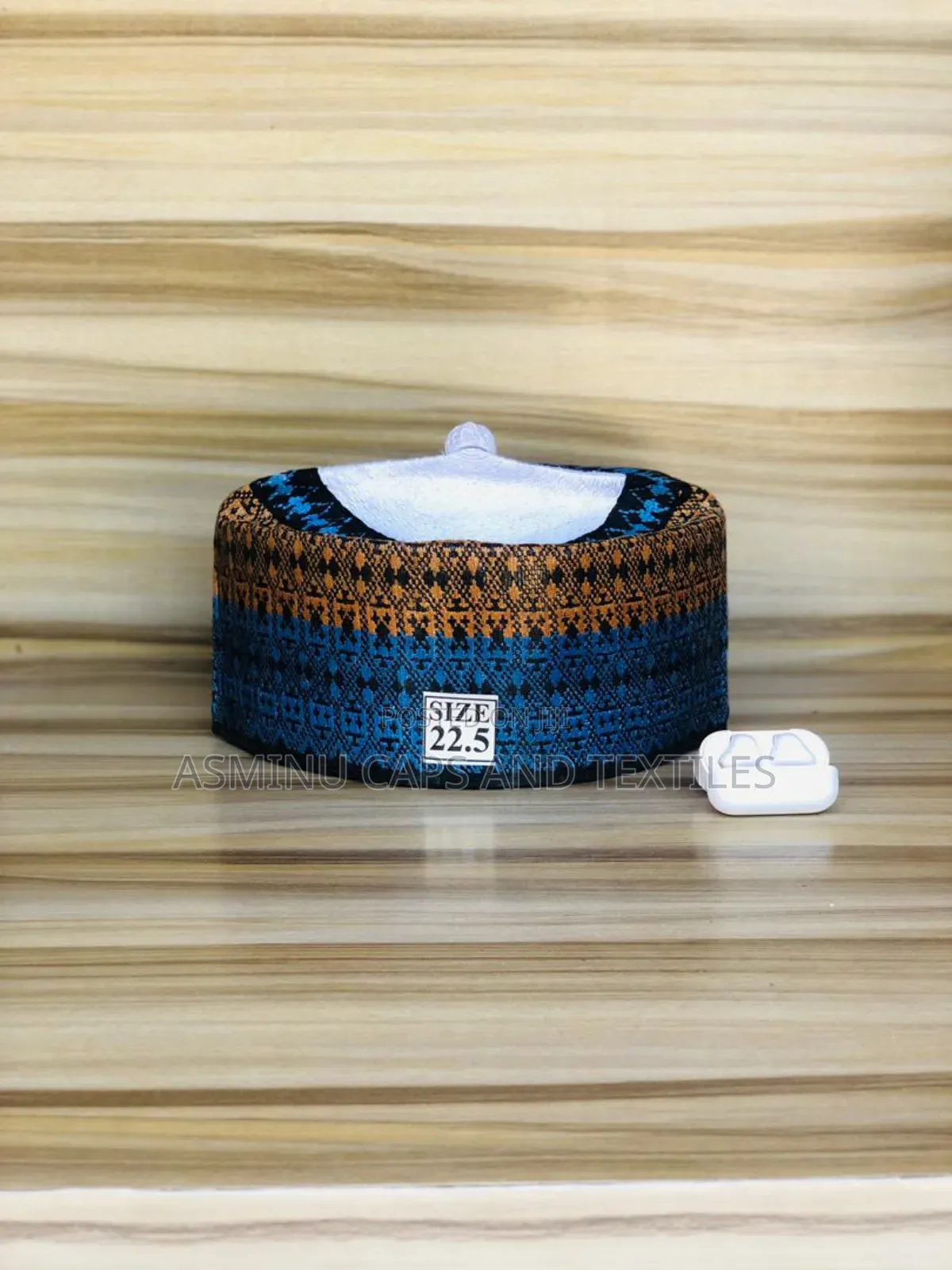 Asminu Caps and Textiles