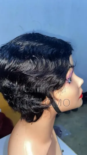 Auxillary Wigs And Adire Kampala Fabric