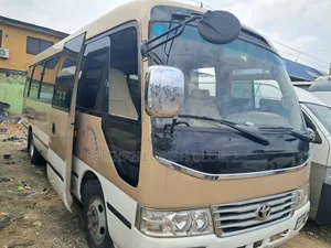 Toyota Coaster 2017 Gold