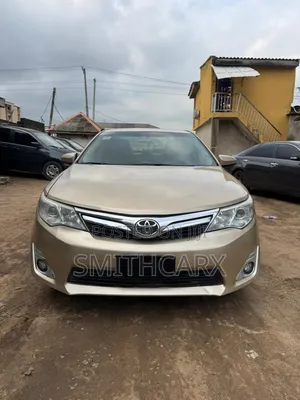 Toyota Camry LE 4dr Sedan (2.5L 4cyl 6A) 2012 Gold