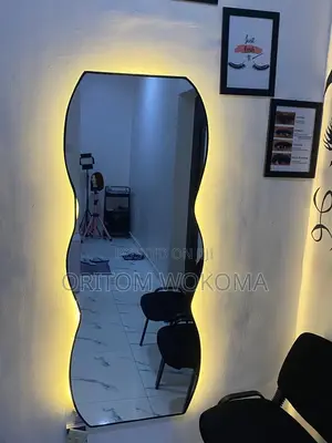 Mirror With Tap Light