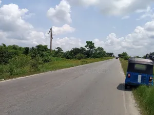 9 Acres of Land Along Orerokpe Express for Sale