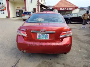 Toyota Camry LE V6 4dr Sedan (3.5L 6cyl 6AM) 2010 Red