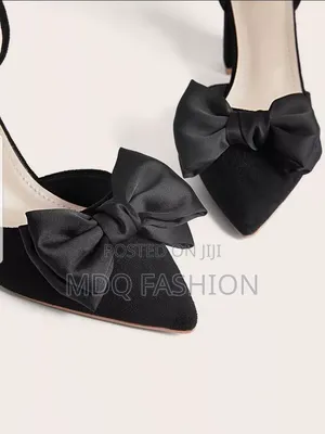 Elegant Black Suede Pointed Heels With Statement Satin Bow