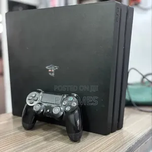 Sony Ps4 Pro With Original Pad and Games