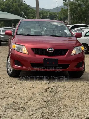 Toyota Corolla Base 4dr Sedan (1.8L 4cyl 5M) 2010 Red