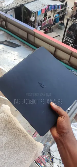 Sony Playstation 4 Slim With 5 Games