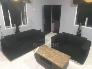 Cleanly Used Chair With Center Table