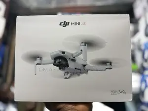 Dji Mini Drone With 2 Batteries, Carrying Bag and Extra Propellers