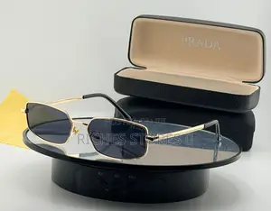 Prada Sunglasses With Dark Metal Frame and Gradient Lens