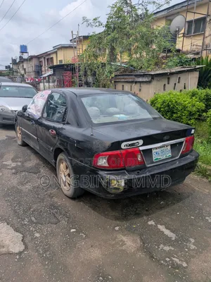 Kia Optima LX Sedan FWD (2.4L 4cyl 5M) 2003 Black