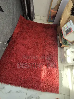A Beautiful, Fairly Used, Neat Red Rug