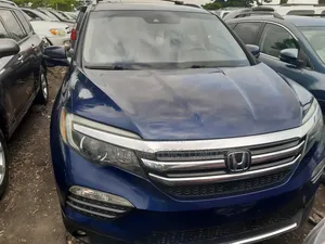 Honda Pilot Touring 4dr SUV 4WD (3.5L 6cyl 9A) 2017 Blue