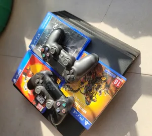 Neat Ps4 Pro With 2 Pads and 4 Games