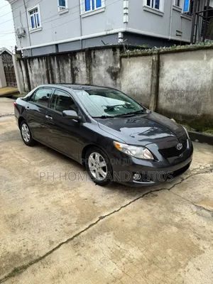 Toyota Corolla Base 4dr Sedan (1.8L 4cyl 5M) 2010 Black