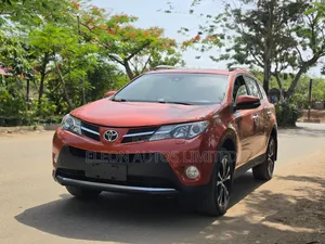 Toyota RAV4 Limited 4dr SUV AWD (2.5L 4cyl 6A) 2015 Orange