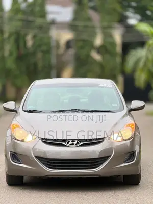 Hyundai Elantra GLS Sedan FWD (1.8L 4cyl 6M) 2013 Gold