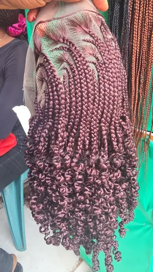 Brush Cornrows With Twisting Curls