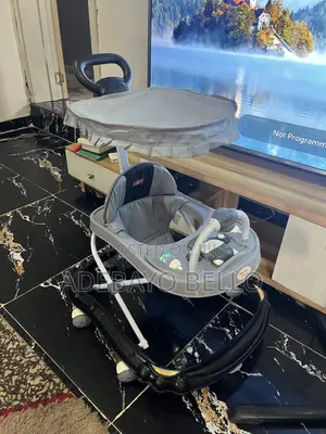 Barely Used Baby Walker With Music and Umbrella