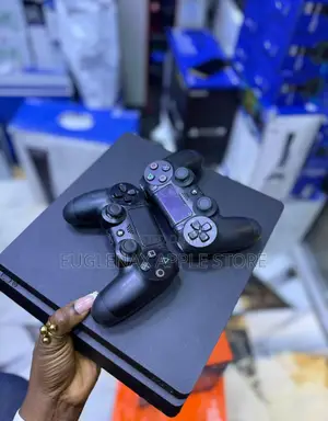 Playstation 4 Slim With Two Pad and Games