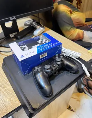 Playstation 4 Slim With Two Pad and Games