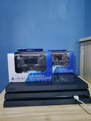 Uk Used Ps4 Pro 1tb With 15 Games and 2 Pads