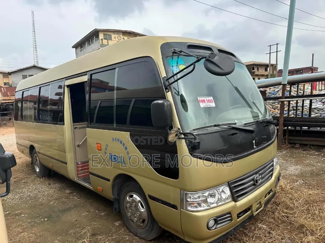 Toyota Coaster 2011 Gold