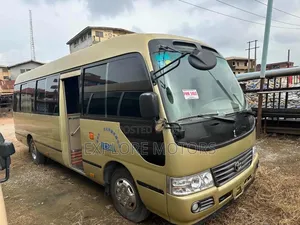 Toyota Coaster 2011 Gold