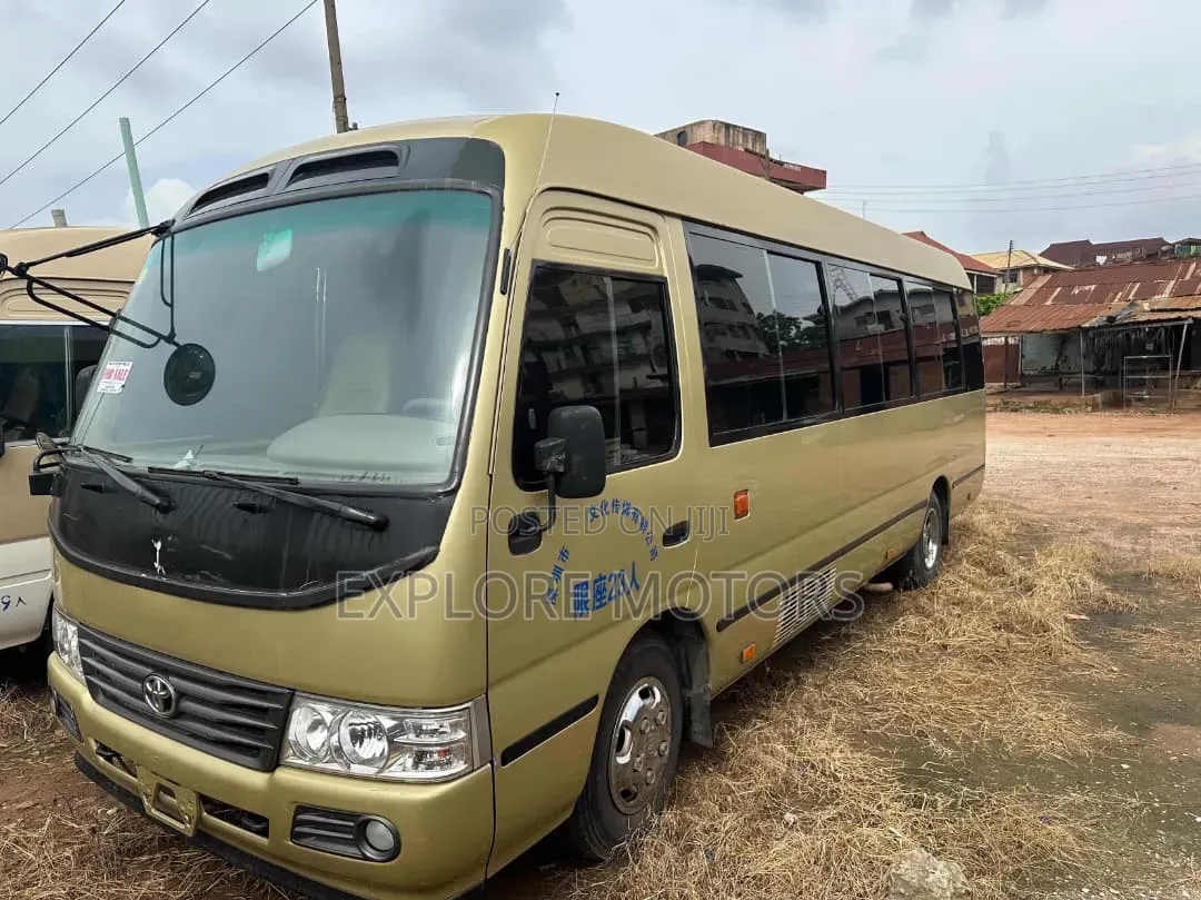 Toyota Coaster 2011 Gold