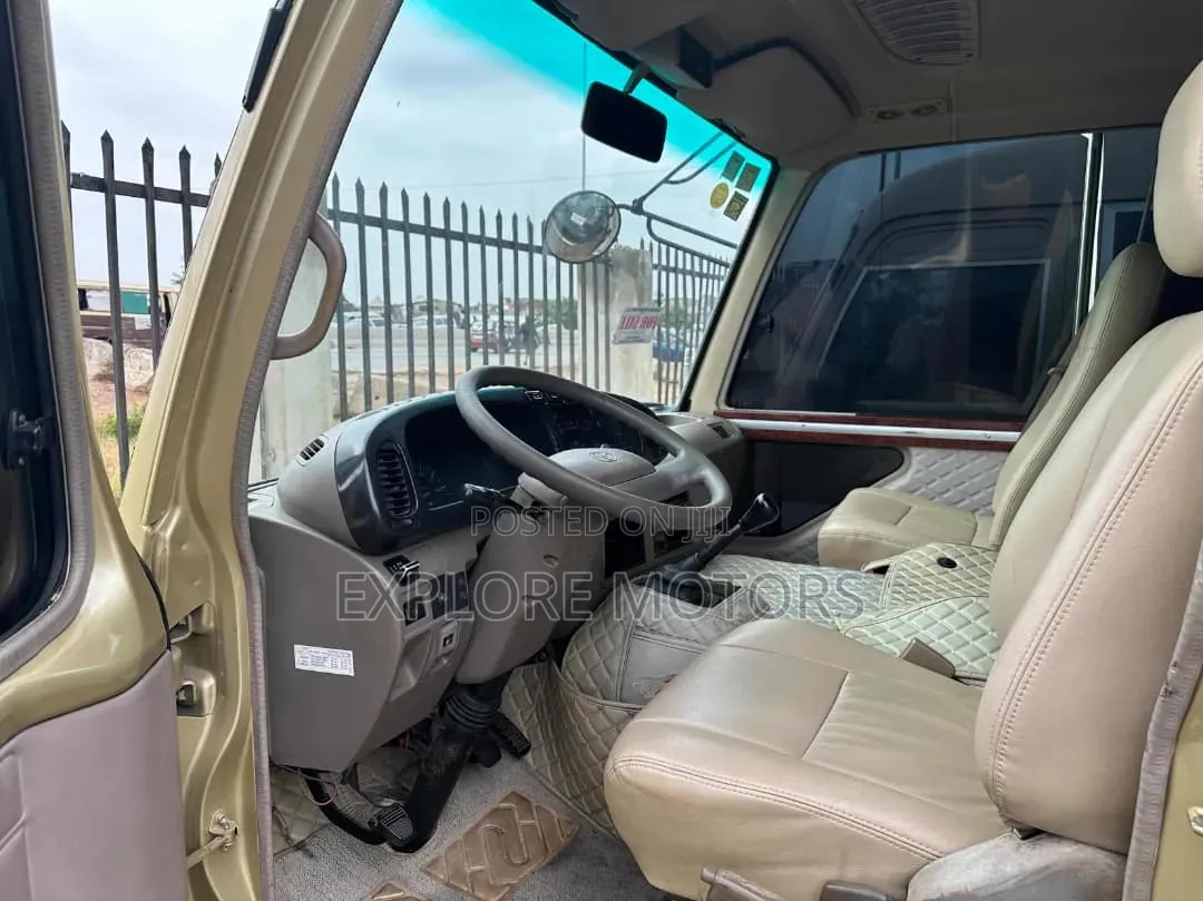 Toyota Coaster 2011 Gold