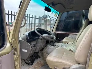 Toyota Coaster 2011 Gold