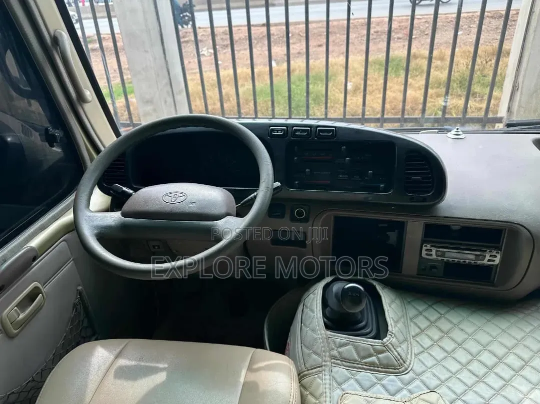Toyota Coaster 2011 Gold