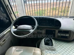 Toyota Coaster 2011 Gold