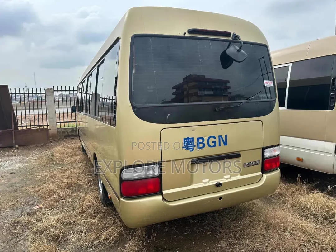 Toyota Coaster 2011 Gold
