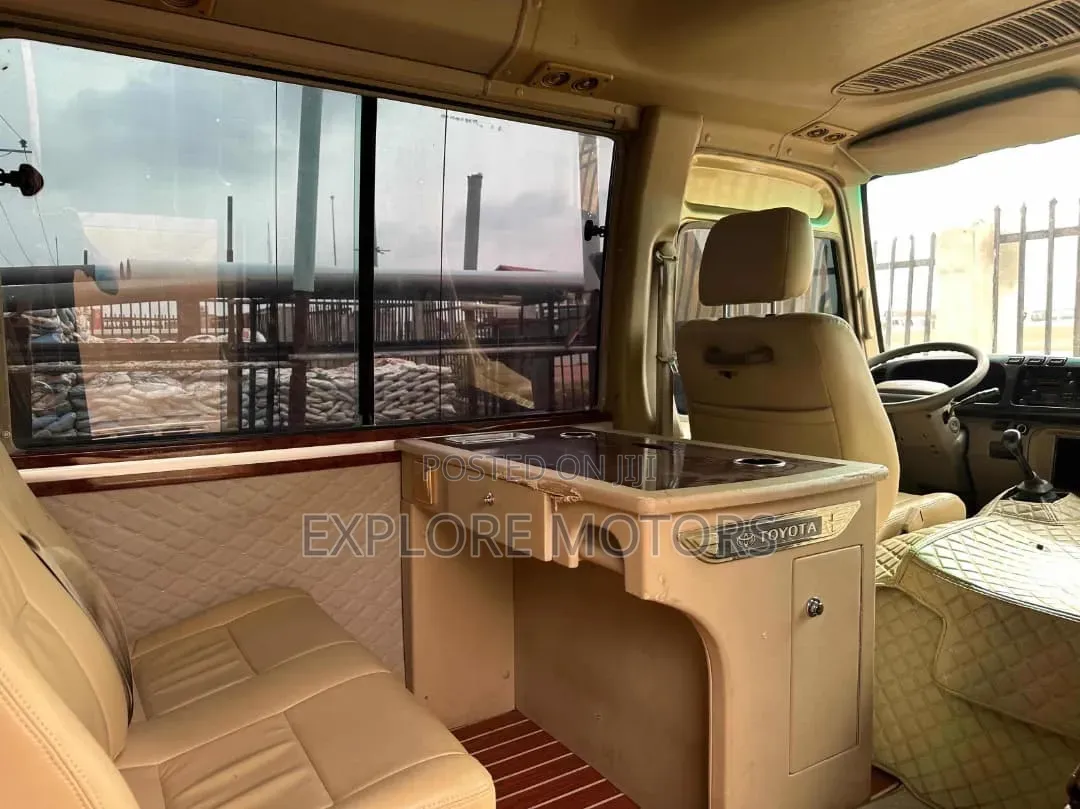 Toyota Coaster 2011 Gold