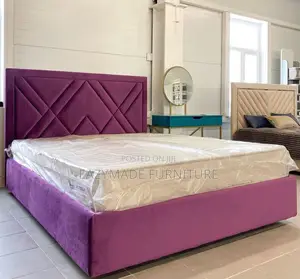 A Full Upholstery 6 by 6 Bed Frame