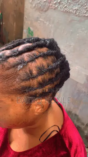 Loctician/Dreadlock