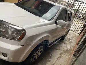 Honda Pilot Touring w/RES/Navi FWD (3.5L 6cyl 5A) 2010 White