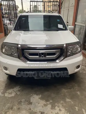 Honda Pilot Touring w/RES/Navi FWD (3.5L 6cyl 5A) 2010 White