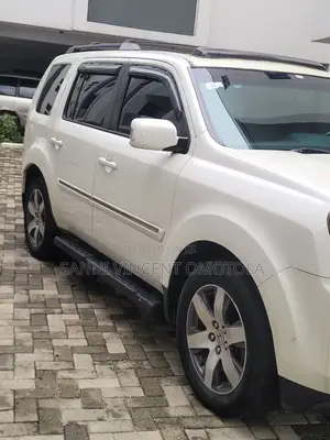 Honda Pilot Touring w/RES/Navi 4WD (3.5L 6cyl 5A) 2013 White