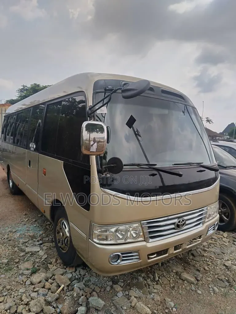 Toyota Coaster 2010 Gold