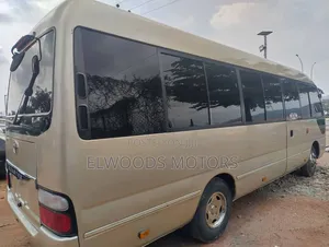 Toyota Coaster 2010 Gold