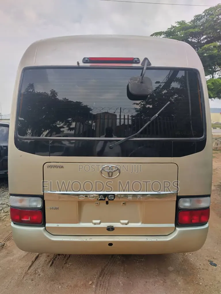 Toyota Coaster 2010 Gold