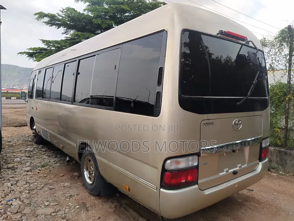 Toyota Coaster 2010 Gold