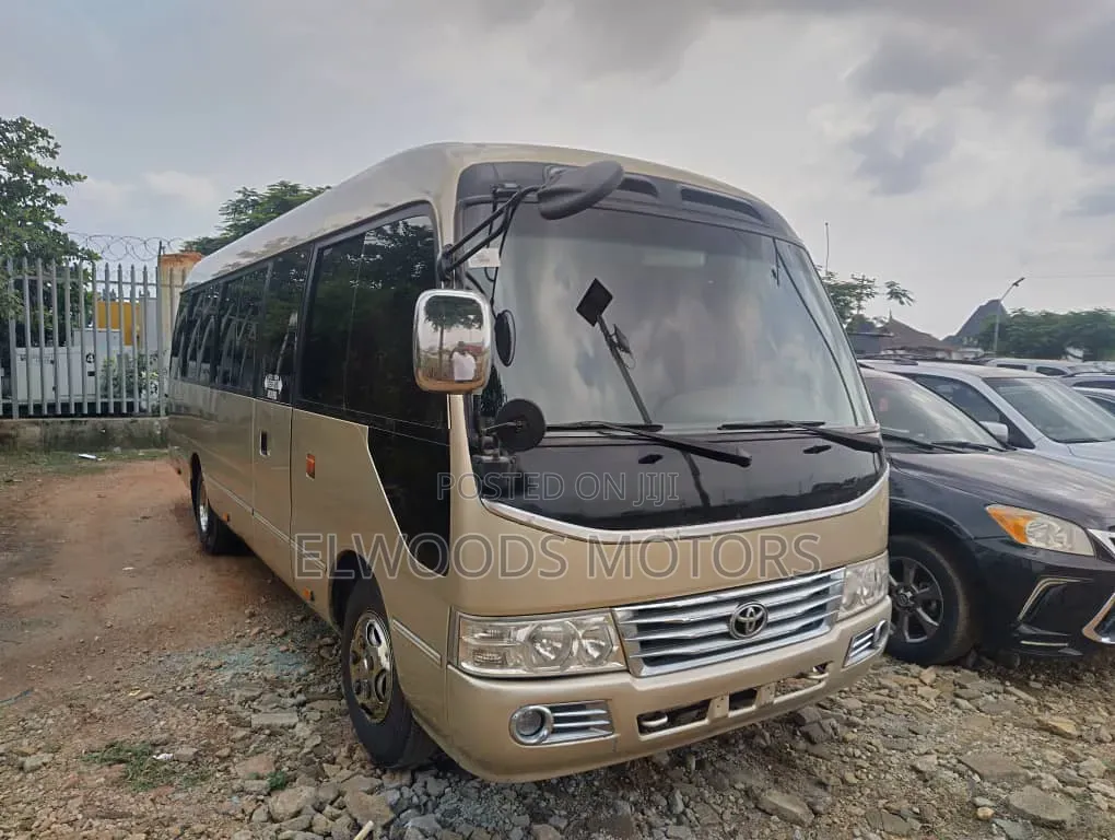 Toyota Coaster 2010 Gold