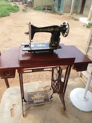 Neatly Used Two Lion Manual Sewing Machine With Leg