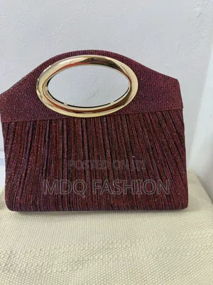 Pleated Burgundy Wine Shimmer Clutch With Gold Oval Handle