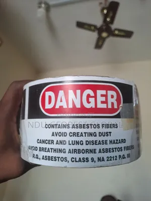 Danger Contains Asbestos Fibers