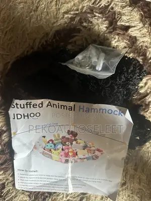 Black Mesh Hammock Designed to Store Plush Toys.