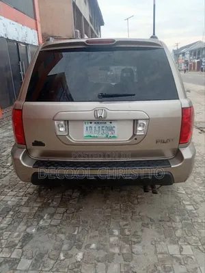 Honda Pilot EX-L 4x4 (3.5L 6cyl 5A) 2005 Gold